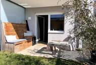 Erdgeschosswohnung mit Terrasse, Garten, PV und Kamin