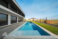 Exklusive Designvilla mit repräsentativem Firmensitz, 15-Meter-Pool und privater Fahrzeuggarage
