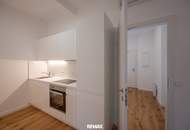 Sanierter Altbau mit modernem Neubau