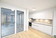 Erstbezug: Schöner 3-Zimmer-Neubau mit Terrasse und Garten