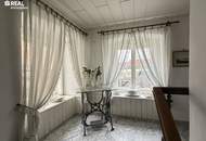 3-Zimmer-Dachgeschosswohnung mit Blick auf die Kirche – Top-Lage am Hauptplatz in Bruck an der Leitha