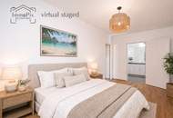 Moderne 2-Zimmer-Wohnung mit überdachtem Balkon und Grünblick