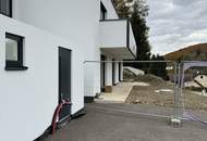 Modernes Zweifamilienhaus mit Gartenwohnungen – Erstbezug!