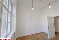 Stuck, Kachelofen, Flügeltüren: Altbauliebe mit Klopfbalkon