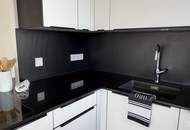 Moderne Dachgeschoss-Maisonette in Wien-Mauer mit zwei Balkonen, Garage und Liftzugang auf beiden Ebenen | ZELLMANN IMMOBILIEN