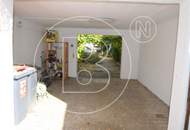 Einfamilienhaus in zentraler Bestlage mit Tennisplatz auf parkähnlichem Grund!