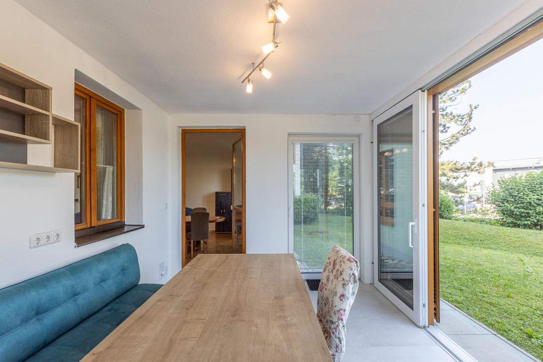 Charmante Eigentumswohnung mit Wintergarten, Gartenzugang und Tiefgaragenstellplatz - zentrumsnah!