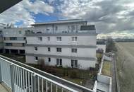 Modernes Wohnen in Laxenburg: Geräumige Wohnung mit Loggia, Einbauküche und Solarenergie