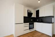 MODERNE 2-ZIMMER BALKONWOHNUNG - ERSTBEZUG UND TIEFGARAGENPLATZ