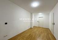 HELLES 2-ZIMMER-APARTMENT MIT GARTENTERRASSE ( BJ 2007 )