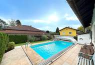 "Haus mit Garten, Pool, und Garage"