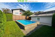„Drei Wohnungen – ein Zuhause: Großzügiges Mehrfamilienhaus mit Pool, Sauna & Fernblick“