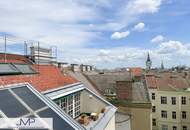 Großzügige DG Wohnung mit 2 ruhigen Südterrassen in zentraler Lage