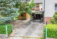Zweifamilienhaus mit großem Garten, KFZ-Stellplätzen, Carport und Garage