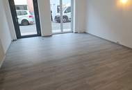 Zentral gelegene Immobilie mit Geschäftslokal und zwei Wohnungen zu verkaufen