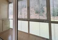 Großzügige Eigentumswohnung mit Balkon, Wintergarten, Gartenanteil und Garagenparkplatz in St. Gertraud