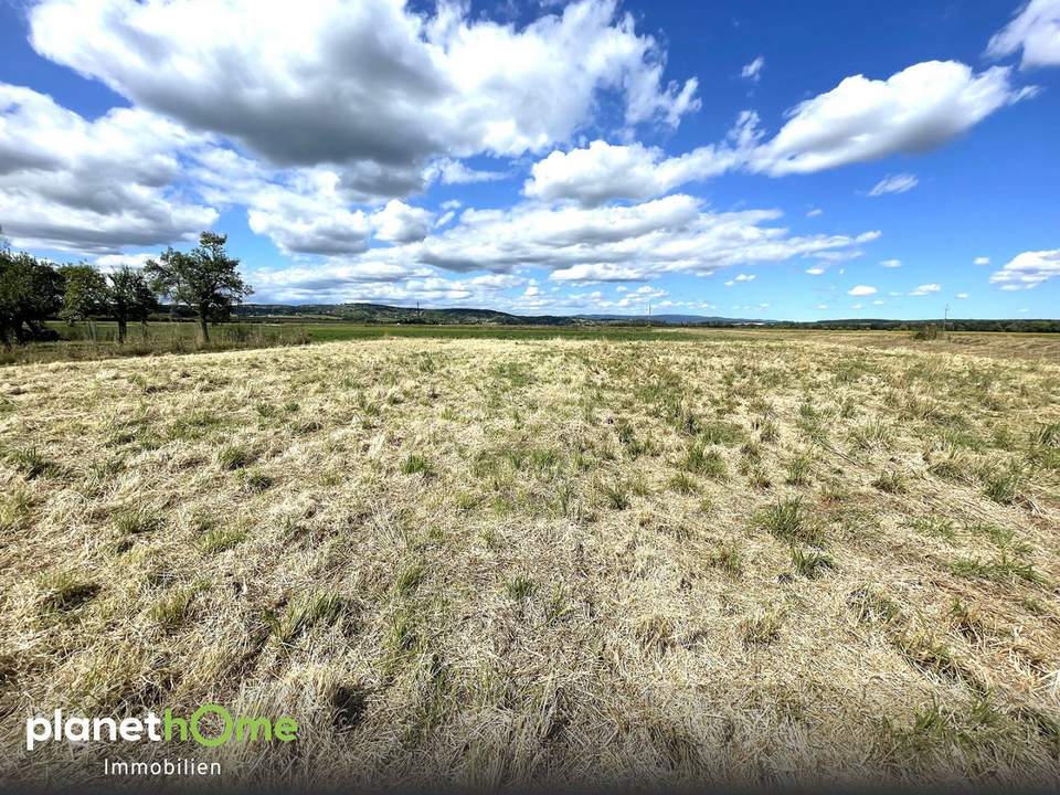 Ebenes Baugrundstück am sonnigen Ortsrand von Deutsch Schützen