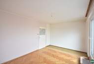 Sanierungsbedürftige Eigentumswohnung mit großzügiger Terrasse