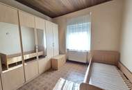 Geräumiges Bauernhaus samt großem Nebengebäude im Bauland