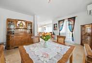 High-end living in a peaceful green location! A feel-good retreat in a class of its own: tradition meets state-of-the-art comfort!