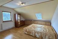 "Charmantes Einfamilienhaus mit Terrasse, Garage und zusätzlichem Grundstück"