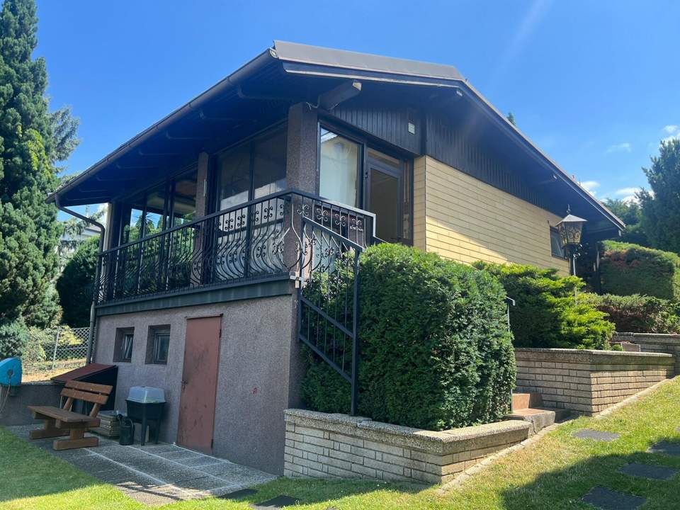 Traumhaftes Einfamilienhaus mit Garten und Sauna mit Seeblick auf Pachtgrund – Ihr neues Zuhause!