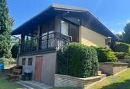 Traumhaftes Einfamilienhaus mit Garten und Sauna mit Seeblick auf Pachtgrund – Ihr neues Zuhause!