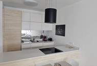Moderne 2-Zimmer-Wohnung mit Einbauküche, Balkon & TG-Stellplatz – ruhig & grün in Favoriten (Provisionsfrei)