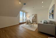 BEIM DONAUUFER: Erstbezug: Klimatisierte Dachgeschosswohnung mit ruhigem Hofbalkon