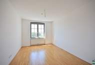 3-Zimmer-Altbau mit hofseitigem Schlafzimmer und Gemeinschaftsterrasse