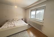 Mehrfamilienhaus mit kompaktem Garten