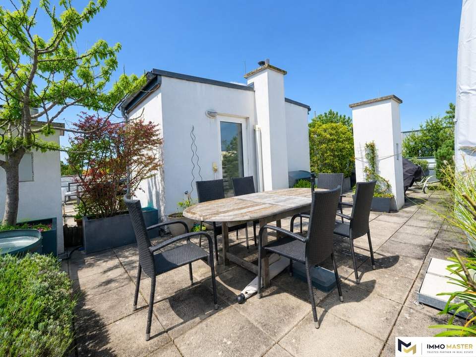Großzügige Maisonette mit privater 48-m²-Dachterrasse und Panoramablick