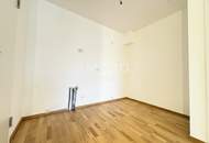 Lichtdurchfluteter Erstbezug: 3-Zimmer mit Loggia und Weitblick in top Lage!
