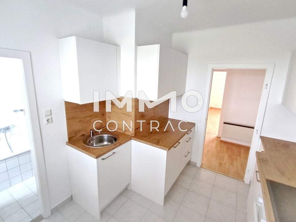 Sonnige Wohnung mit Balkon, Blick in den Garten, Ruhelage am grünen Hügel über der Stadt