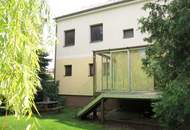 7-Zimmer Familienhaus mit Wintergarten und idyllischem Garten !