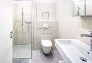 Dachgeschosswohnung in Niedrigenergiebauweise und 23m² Terrasse mit spektakulärem Fernblick.