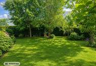 GROSSZÜGIGE GARTENWOHNUNG MIT CARPORT