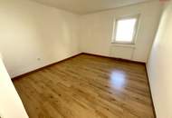 Herrlich sanierte Erdgeschosswohnung mit moderner Wohnküche, stilvollem Badezimmer und Grünblick - in ruhiger Siedlungslage mit ausgezeichneter Infrastruktur, ideal für kleine Familien!
