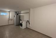 Modernes Plus-Energie-Reihenhaus in Massivholzbauweise