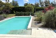 Modernes Bürogebäude mit Wohnnutzung und Pool!
