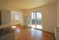 Reizende 3-Zimmer-Wohnung mit 2 Balkonen, gartenseitiger Veranda und Garagenplatz