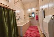 Einzigartige Seelage auf Eigengrund – Seehaus mit privatem Steg und großem Potenzial nahe Wien!