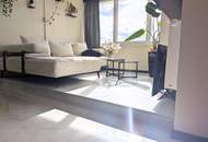 Traumhafte 2-Zimmer-Wohnung mit Penthouse-Flair und Weitblick durch den Wintergarten