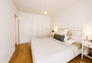 Moderne Gartenwohnung mit Terrasse in neuwertigem Wohnkomplex