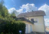 Gepflegtes Einfamilienhaus mit großer Terrasse und vielen Garagen!