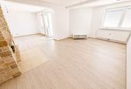 Großzügige 3 bis 4-Zimmer-Wohnung mit Kamin, sonniger Loggia und Stellplatz