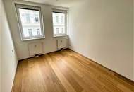 GOLDSCHLAGSTRASSE, sonnige 47 m2 Neubau, 2 Zimmer, Parketten, Komplettküche, Wannenbad, 1. Liftstock, Westbahnhof-Nähe