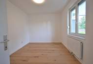 Charmante 2-Zimmer-Wohnung mit Südausrichtung mit eigenem Garagenstellplatz