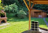Idyllisches Holzblockhaus in Naturrandlage