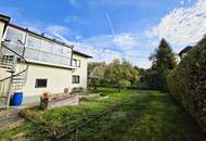 Gepflegtes Wohnhaus mit Wintergarten, Doppelgarage und sonnigem Garten